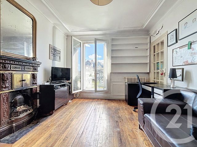 Afficher la photo en grand Appartement F3 à vendre - 3 pièces - 60.35 m2 - PARIS - 75018 - ILE-DE-FRANCE - Century 21 Quartier Des Théâtres