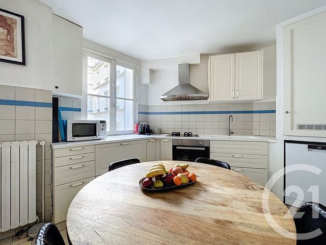 Appartement F4 à louer - 4 pièces - 107.61 m2 - PARIS - 75009 - ILE-DE-FRANCE - Century 21 Quartier Des Théâtres