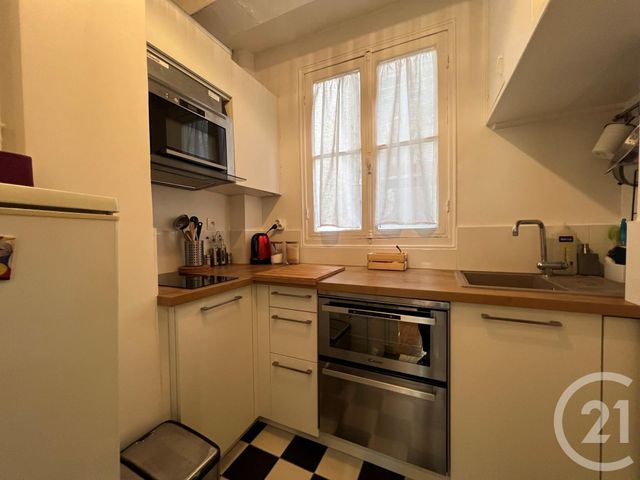 Appartement F2 à louer - 2 pièces - 39.51 m2 - PARIS - 75018 - ILE-DE-FRANCE - Century 21 Quartier Des Théâtres